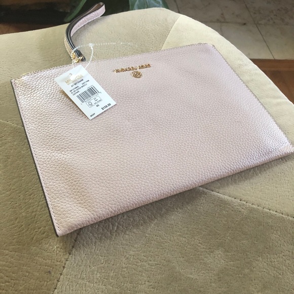 Michael kors large light pink wristlet with gold hardware. - Picture 2 of 10